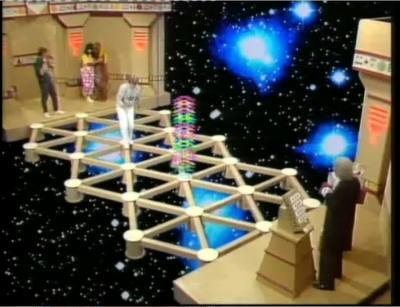 An image of the Vortex game as seen in the 1980's British childrens show "The Adventure Game" where the three Earthlings would have to cross a triangular array of jump pads and avoid the invisible (to them) Vortex and try to get home to Earth. The structure looks identical to the ELT support mirror structure.